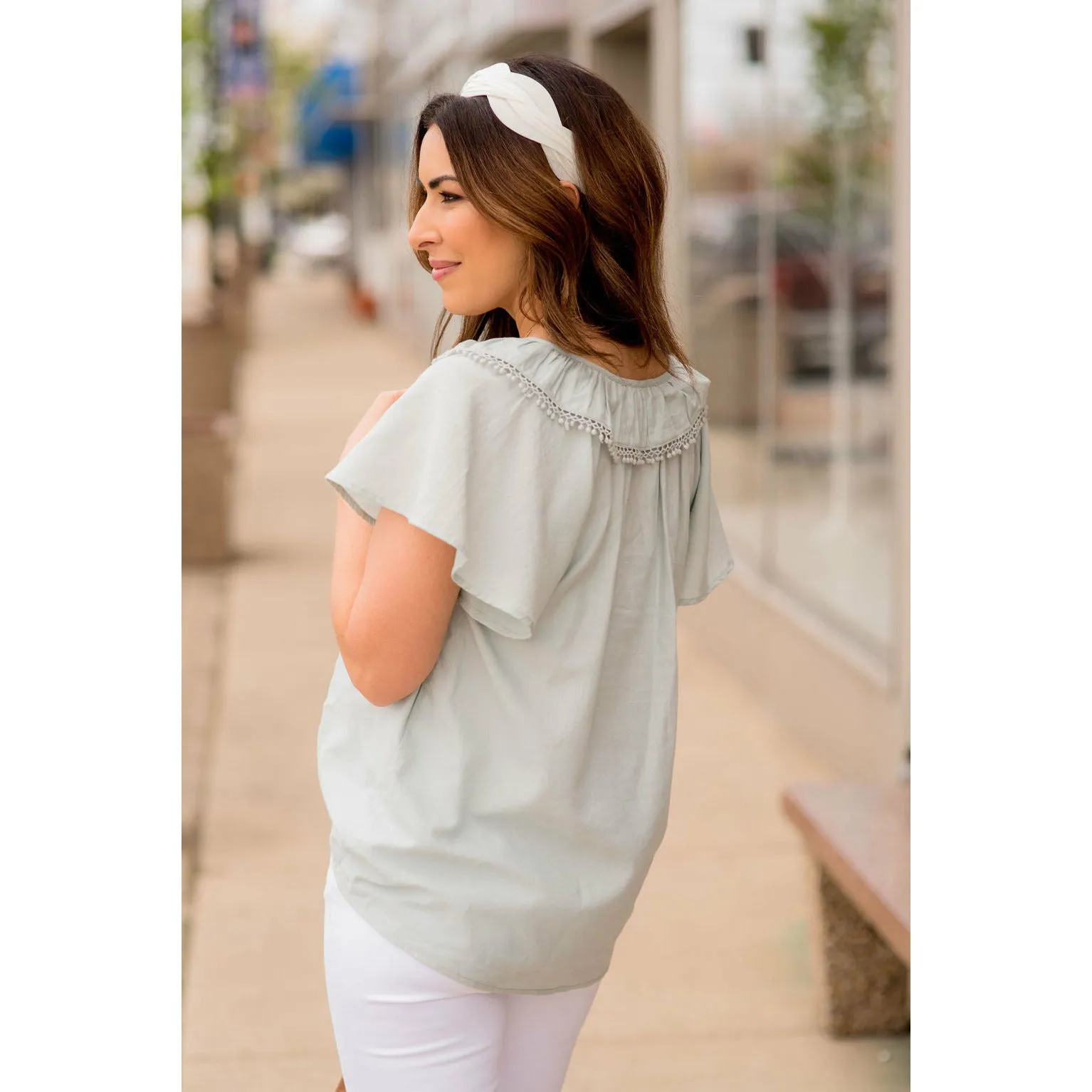 Pom Trim Flutter Sleeve Blouse